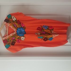 Women's Mexican embroidered dress.